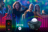 People dancing with a Bluetooth light show device and smartphone app interface.